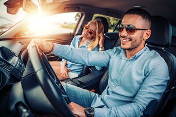 Driving couple  at Canyon Terrace Apartments, Folsom, 95630